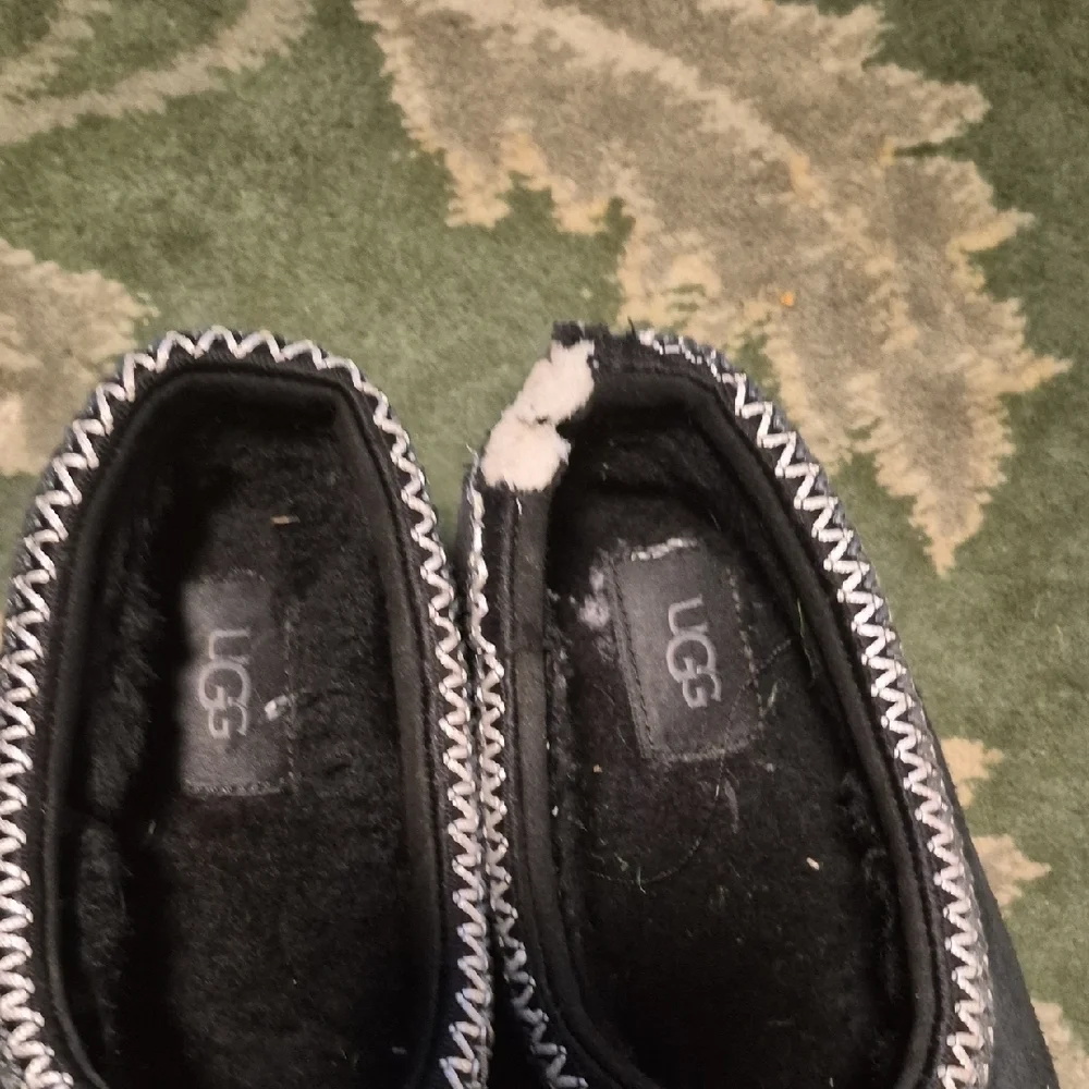 UGG Black Suede Slip-Ons with White Trim